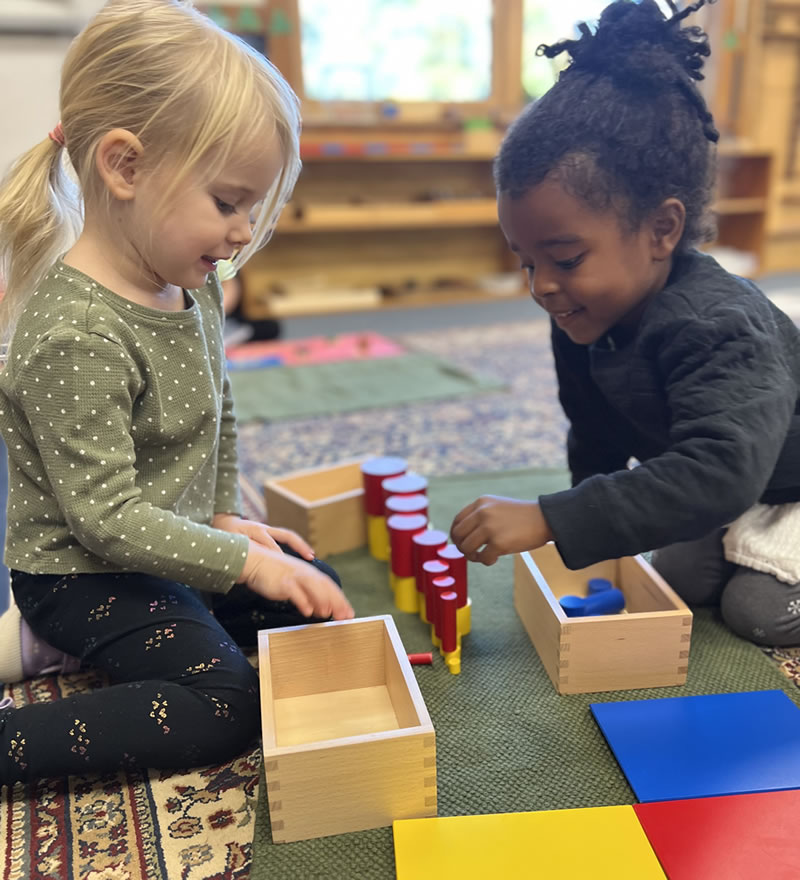 Children playing with colored toys