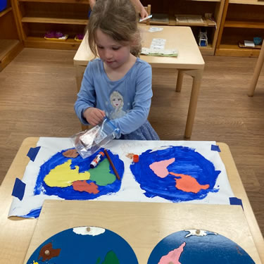 Child playing with paints